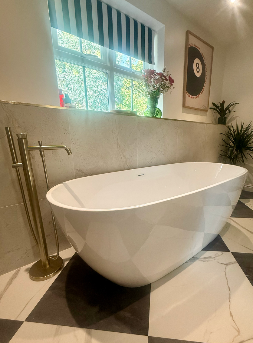 Freestanding Bath with Brushed Brass Fluted Freestanding Tap